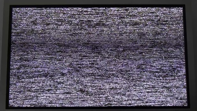 Noise signal on the screen.Flickering analog TV signal with bad interference.