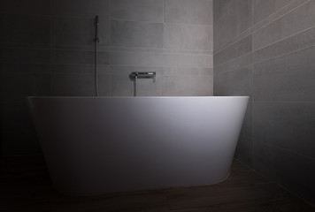 Naklejka na ściany i meble Grey stone tiled modern bathroom with a white bathtub low light photo