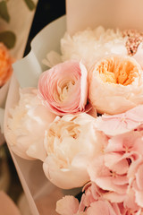 Beautiful spring bouquet with tender pink ranunculus and hydrangea flowers, elegant floral decoration