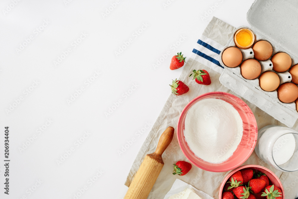 Fototapete Set ingredients cooking strawberry pie cake white background border Flat lay top view Eggs flour milk sugar strawberry top view Bakery background Recipe strawberry pie Rustic style