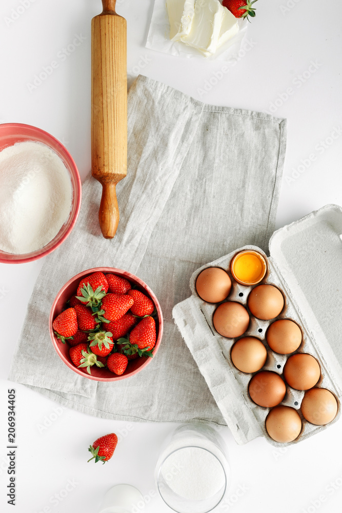 Canvas Prints Ingredients cooking strawberry pie cake white table free space text object Flat lay top view Eggs flour milk sugar strawberry top view Bakery background Recipe strawberry pie Rustic style