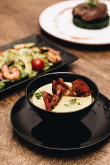 Delicious baked vegetables and shrimps on tray