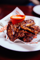 Fried New Orleans chickens. Sweet and spicy served with white dipping.