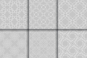Geometric seamless gray patterns. Collection of backgrounds