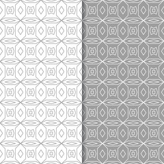 Gray and white geometric ornaments. Set of seamless patterns