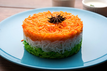 Tricolor Tiranga Rice for indian Republic and Independence day, served in a ceramic plate, selective focus