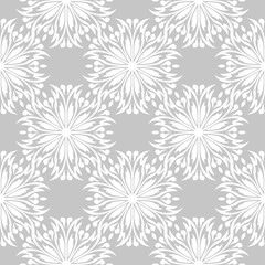 White flowers on gray background. Ornamental seamless pattern