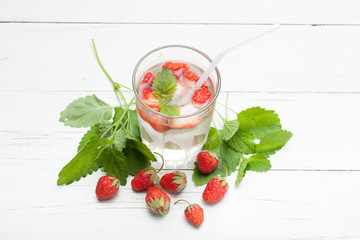 Summer strawberry drink, fresh mint lemonade. Mojito water.