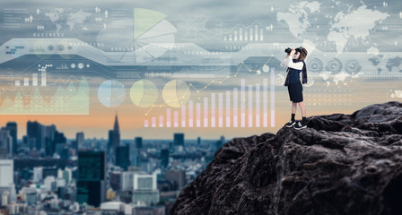 Child using binoculars and information technology concept.