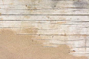 Zelfklevend Fotobehang Sand on planked wood. Summer background with copy space. Top view © puckillustrations