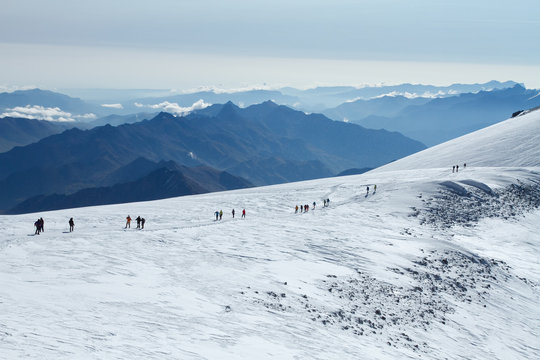 People go to the top of Mount Elbrus