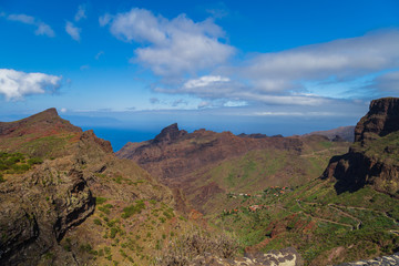 Canyon. A path on a desert island. The path in the gorge. Ancient pirate village Masca. Hiking in Gorge Masca. Volcanic island. Mountains of the island of Tenerife, Canary Island, Spain.