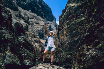 the girl conquered the mountains. Canyon. A path on a desert island. The path in the gorge. Ancient pirate village Masca. Hiking in Gorge Masca. Volcanic island. Mountains of the island of Tenerife