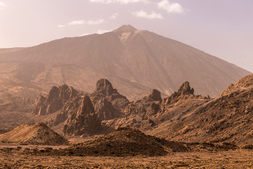 Teide National Park. Volcanic mountain scenery. Pico del Teide. View of Teide volcano peak and Teleferico Del Teide cable road. Tenerife, Canary Islands, Spain 