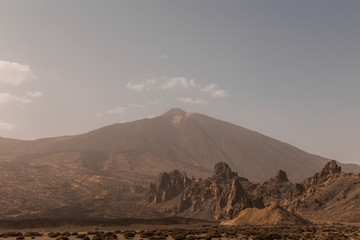 Plakat Teide National Park. Volcanic mountain scenery. Pico del Teide. View of Teide volcano peak and Teleferico Del Teide cable road. Tenerife, Canary Islands, Spain 