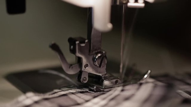 Macro shot of sewing machine in process, close up