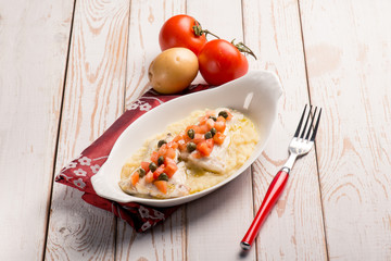 sea bass with fresh tomatoes over mashed potatoes