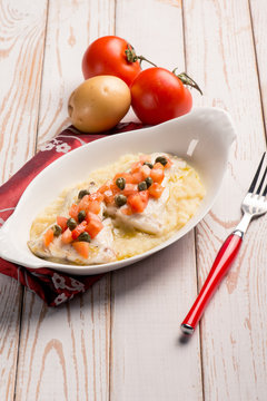sea bass with fresh tomatoes over mashed potatoes