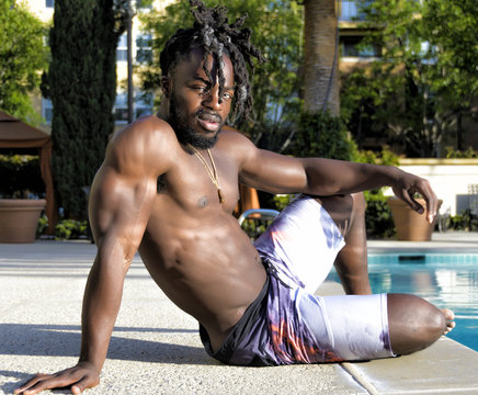 Muscular African American Man by the Pool