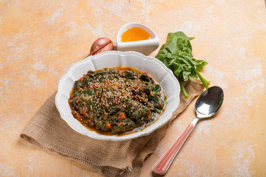 oriental spinach with sesame seed tomato and honey sauce