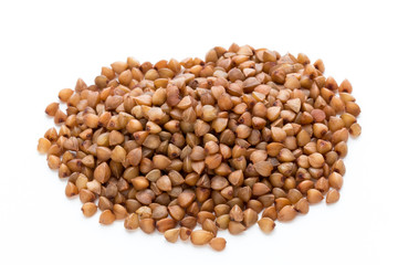 Buckwheat grains isolated on the white background.