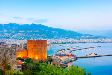 View of Alanya harbour at sunset. Alanya, Turkey - obrazy, fototapety, plakaty