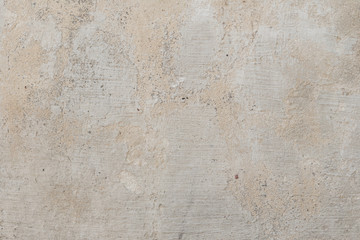 Wall fragment with scratches and cracks