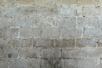 Fototapeta premium Brick texture with scratches and cracks