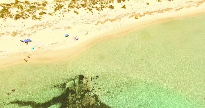 Aerial view of amazing, unspoiled and idyllic beach on a little island