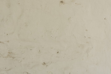 Wall fragment with scratches and cracks