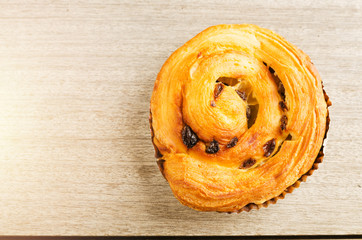 Raisin pie  on wood background