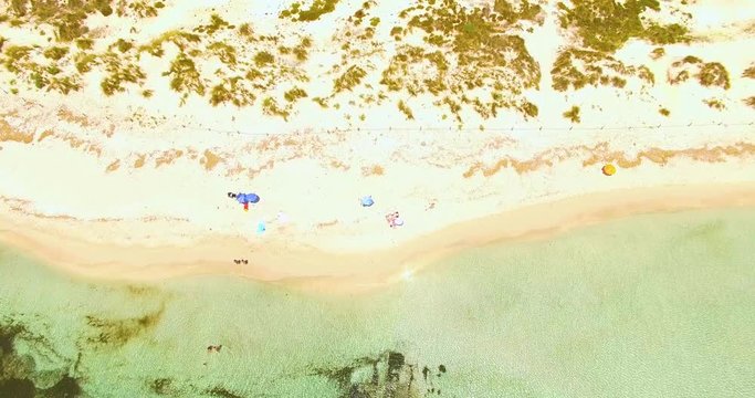 Aerial view of amazing, unspoiled and idyllic beach on a little island