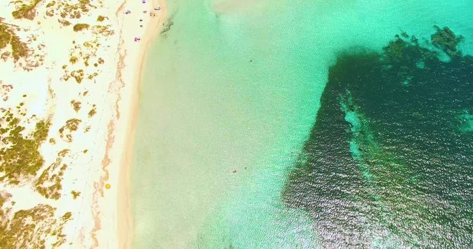 Aerial view of amazing, unspoiled and idyllic beach on a little island