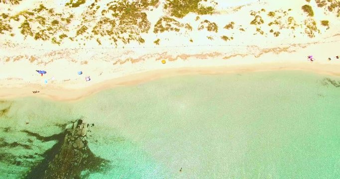 Aerial view of amazing, unspoiled and idyllic beach on a little island
