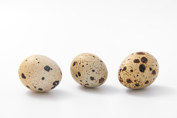 Obraz premium eggs quail spotted small on white background.