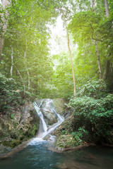 Obraz premium Natural waterfall in the deep forest in Thailand.