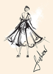 Fashion illustration with the inscription Free your mind. Stylish model. Fashion girl. Sketch. Girl in the dress
