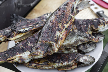 Heap of fresh grilled trout on plate