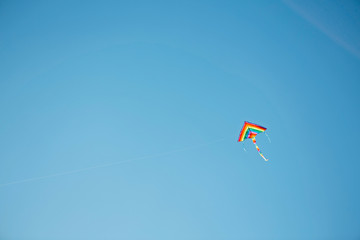 Kite on blue sky.Background. 