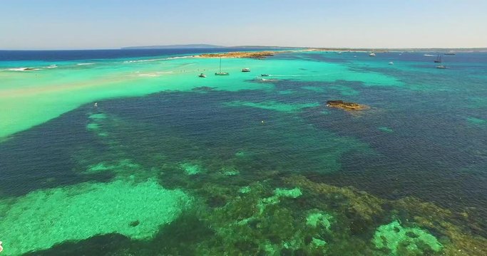 Aerial view of amazing, unspoiled and idyllic beach on a little island