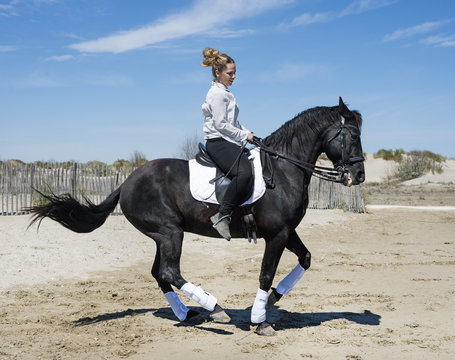 riding girl on the beach