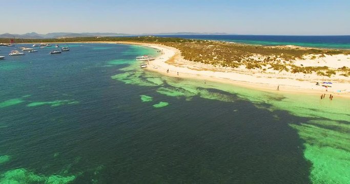 Aerial view of amazing, unspoiled and idyllic beach on a little island
