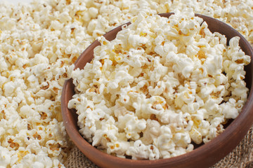 Tasty salted popcorn in bowl