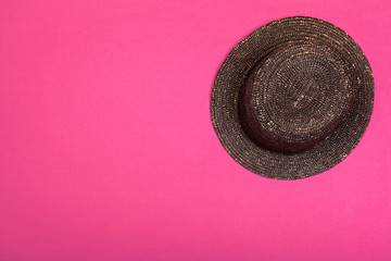 Summer hat on color background. Top view, flat lay
