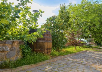 Naklejka premium Old wine press and rustic wine barrel. Wine background in Europe. Czech Republic, South Moravia