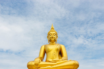 Fototapeta na wymiar Great Golden Buddha statue in the sky in the daytime.