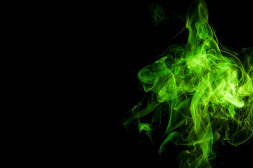 Green smoke on black background