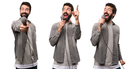 Set of Handsome man with beard singing with microphone