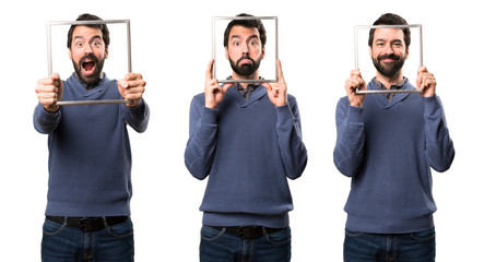 Obraz premium Set of Sad Handsome brunette man with beard with framework