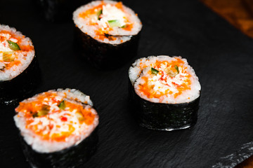 dishes of Japanese cuisine rolls with fish